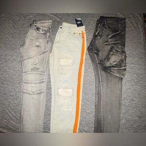Men’s Distressed Slim Fit/Stacked Trio
All size 34